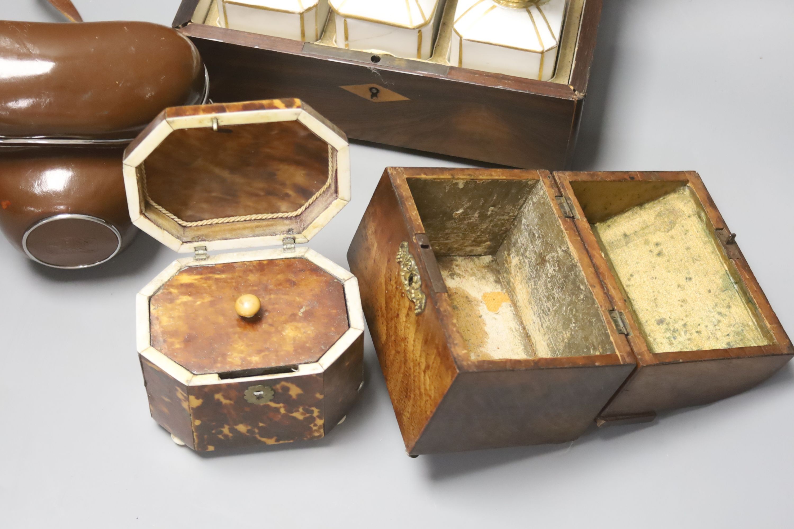 A French rosewood tea caddy, a tortoishell box, a camera and another box